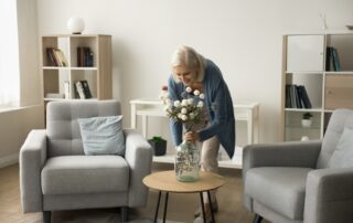 Woman organizing in her memory care apartments.