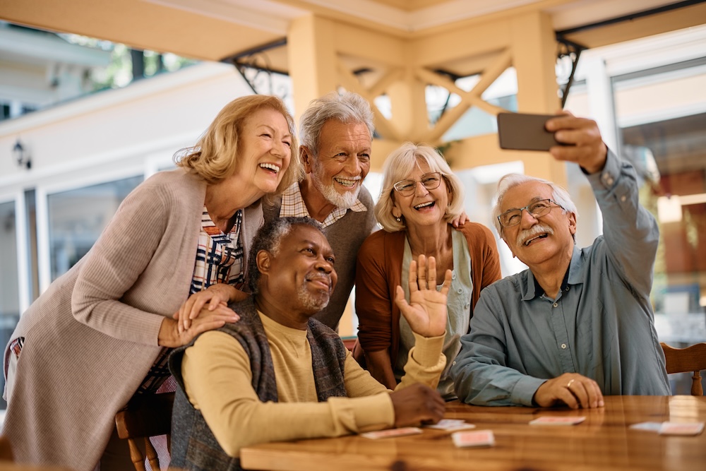 Group of friends enjoying social events at assisted living at Bayshire Yorba Linda